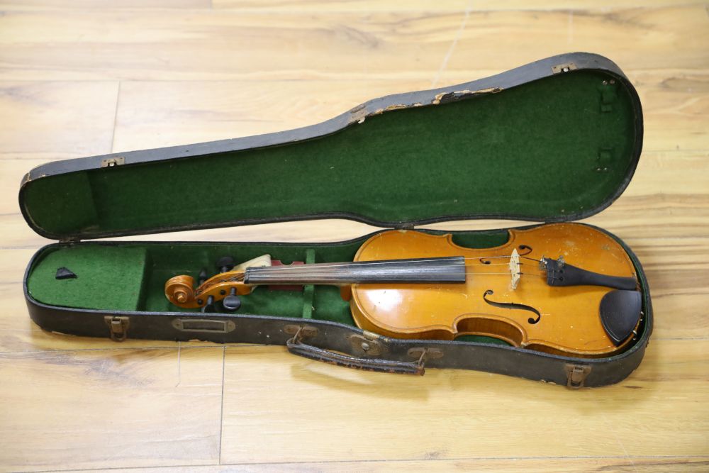 An early 20th century Czechoslovakian 3/4 size violin, bears fake Stradivarius label, cased
